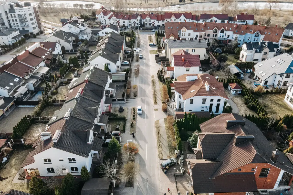 Aerial view of a suburban neighbourhood of detached houses and driveways