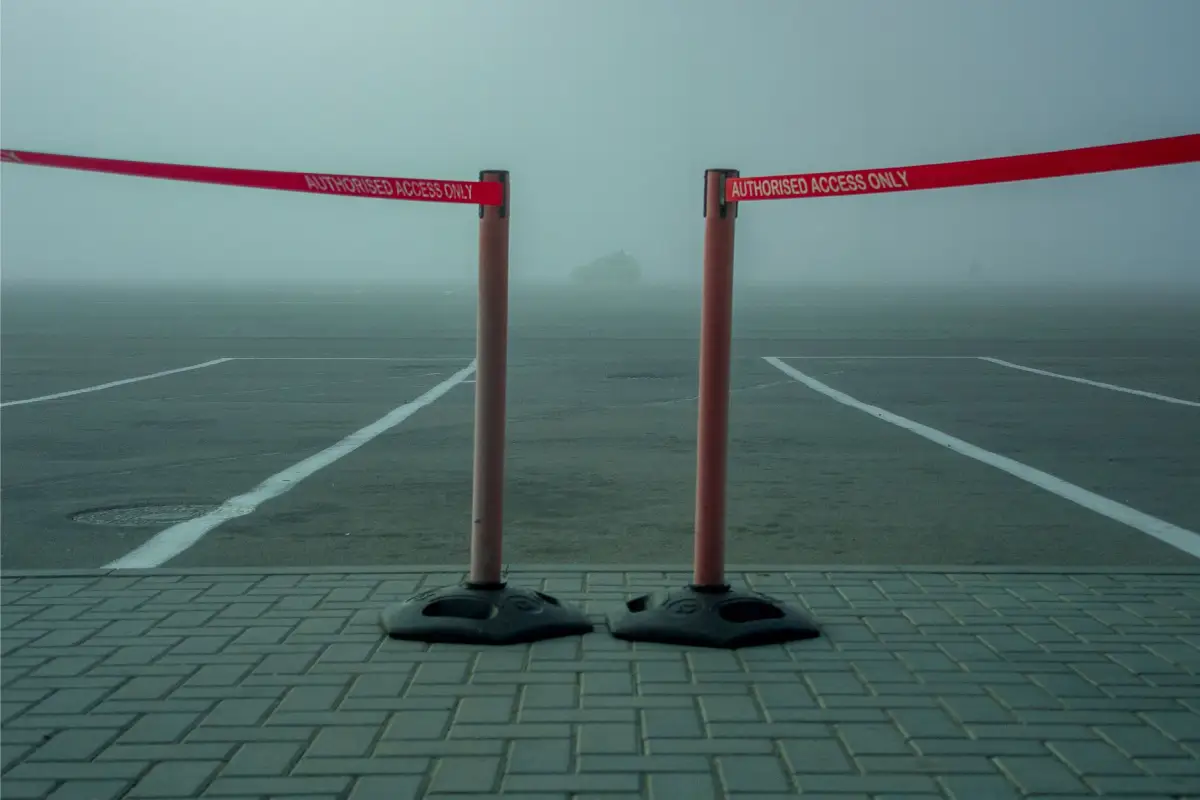 An authorized-access barrier across a commercial lot entrance