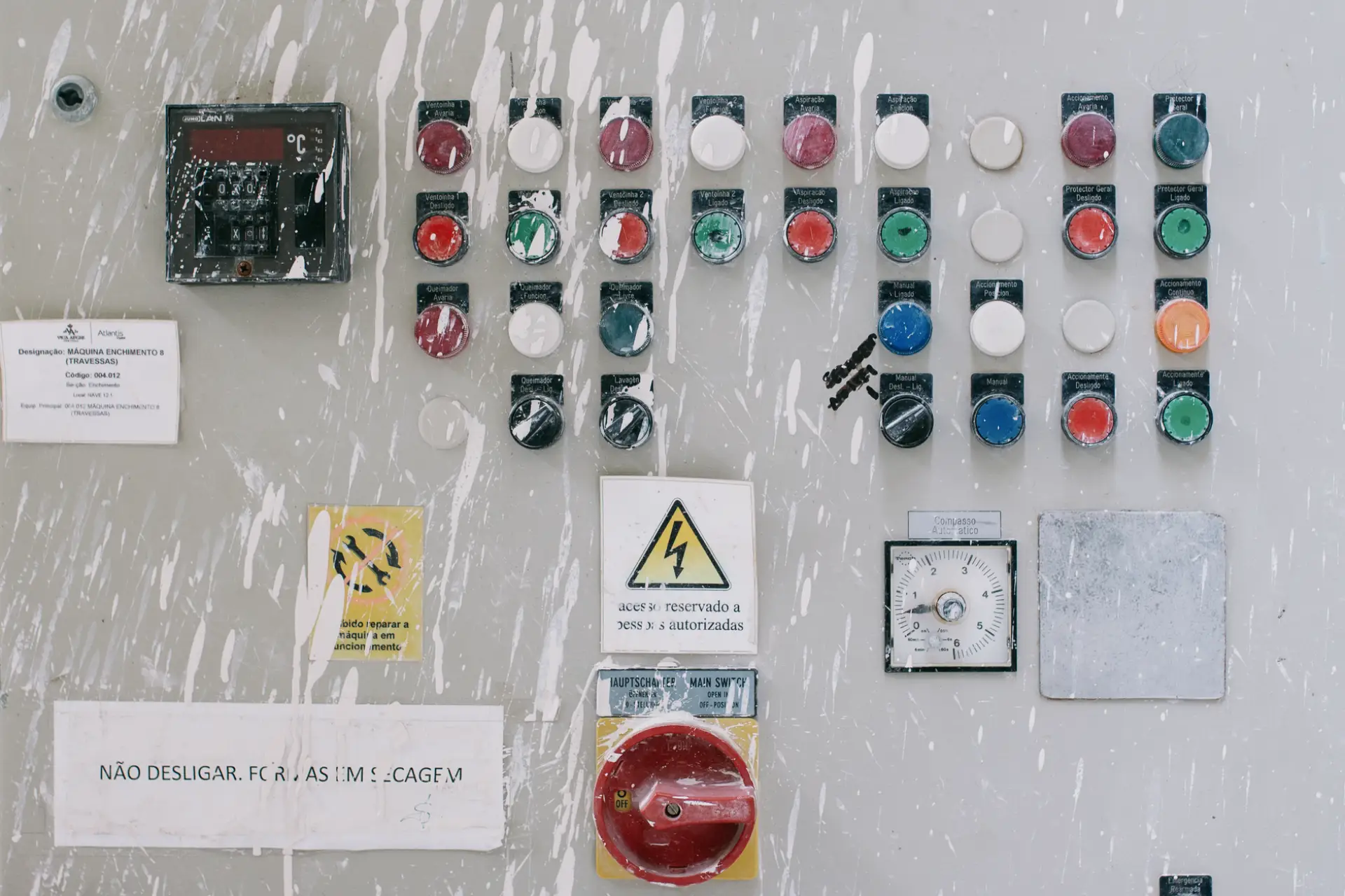 An industrial control panel with indicator switches, used for operator diagnostics