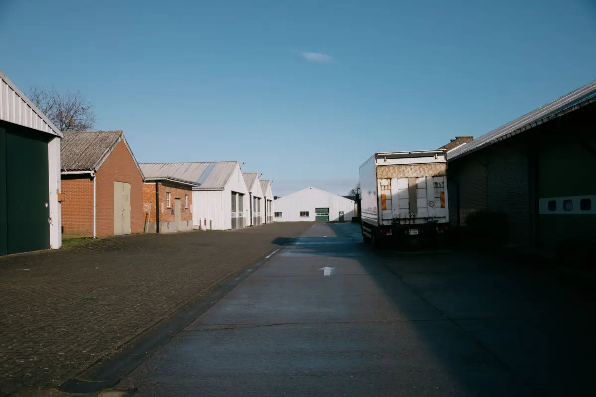 An access road running between logistics buildings