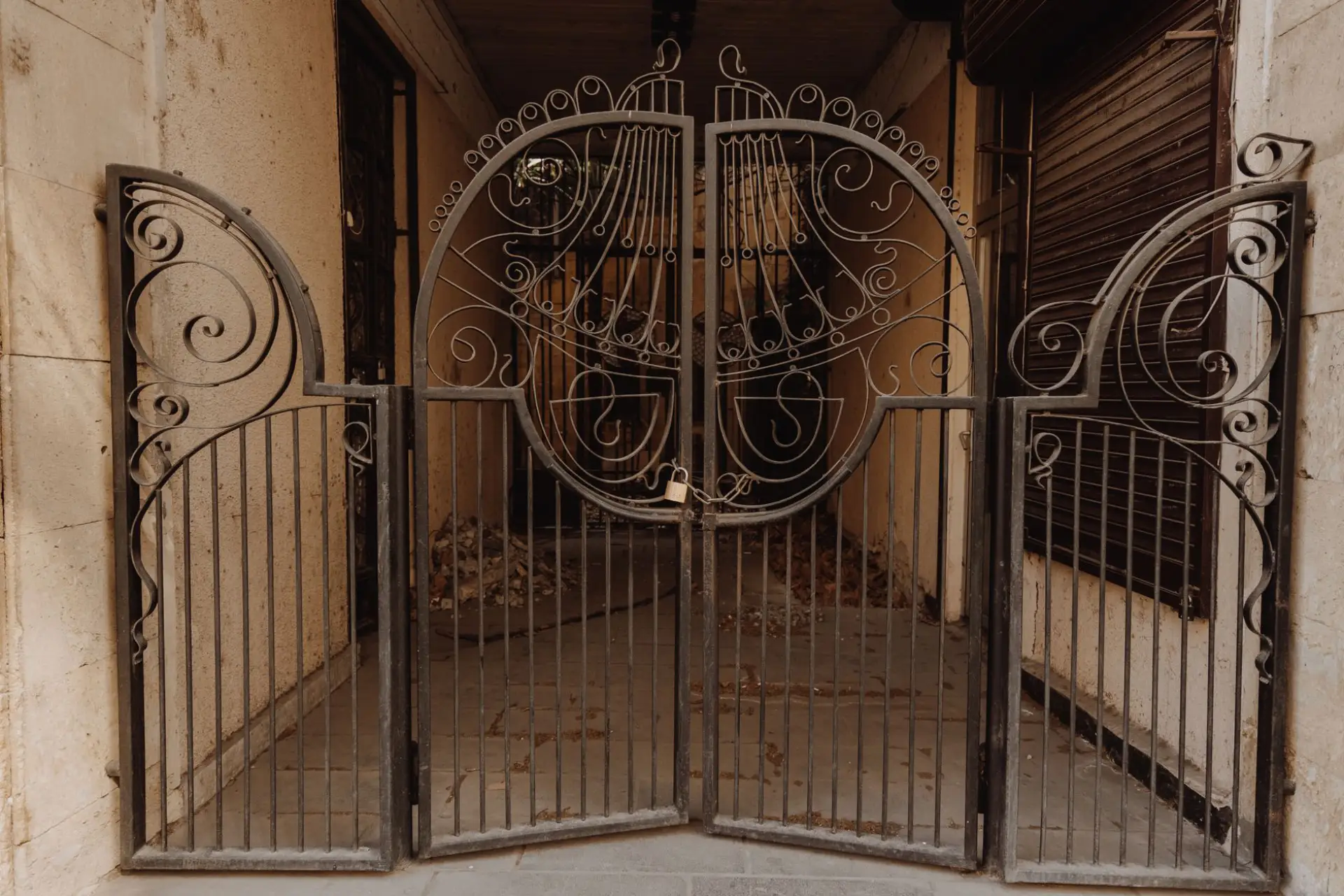 Scrollwork detail on a wrought iron gate